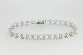 Sterling Silver Semi Mount Tennis Bracelet Setting with round 6x6mm gemstone placeholders.